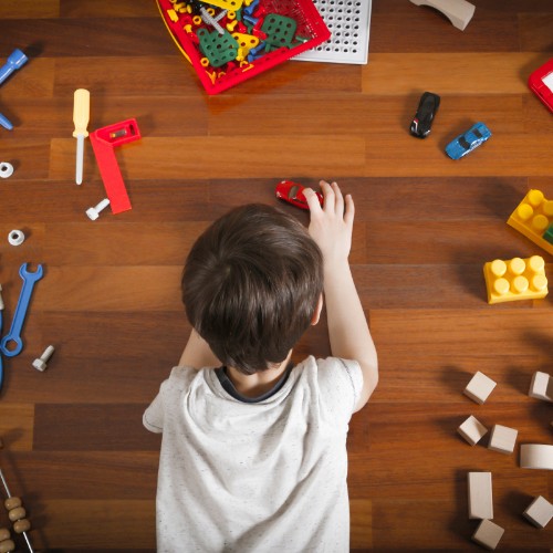 Kid playing with toy cars | Direct Carpet Unlimited