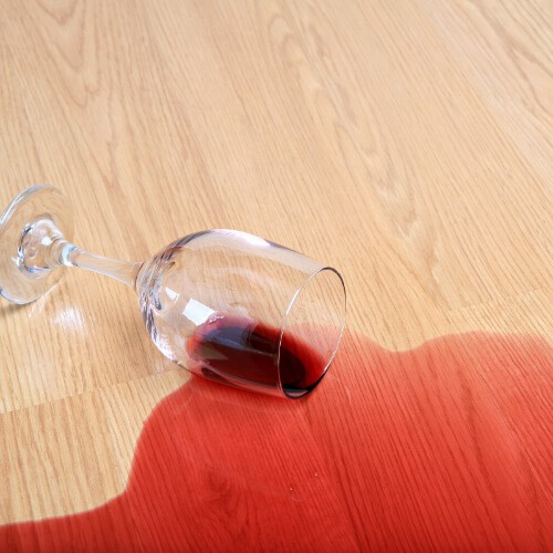 Red wine stain on Laminate floor | Direct Carpet Unlimited