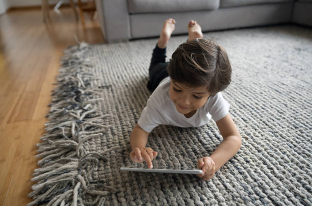 Girl lying on rug | Direct Carpet Unlimited